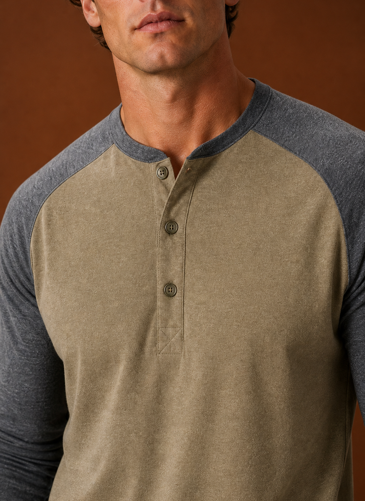 Close-up of the button-placket and neckline detailing on the Henley shirt