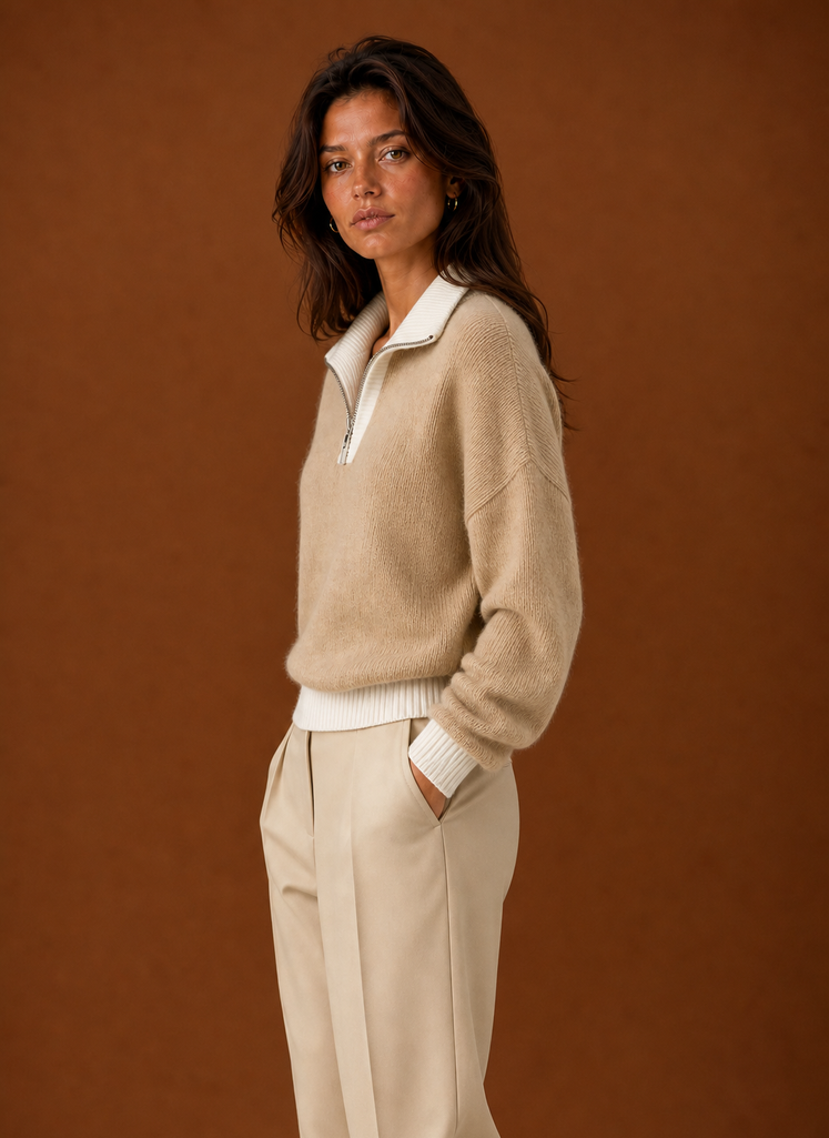 Side view of women's quarter zip sweater highlighting fit and sleeve length