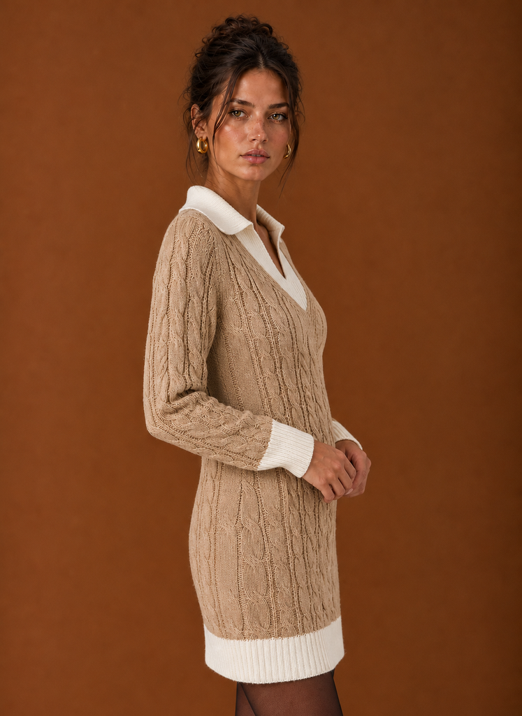 Side view of women's sweater dress showing long sleeves and straight silhouette