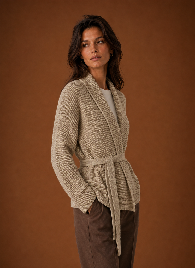 Side view showing drape and belted waist of the women's wrap cardigan