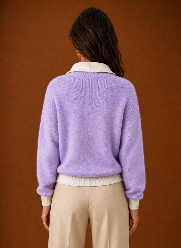 Back view of women's quarter zip sweater with a clean silhouette
