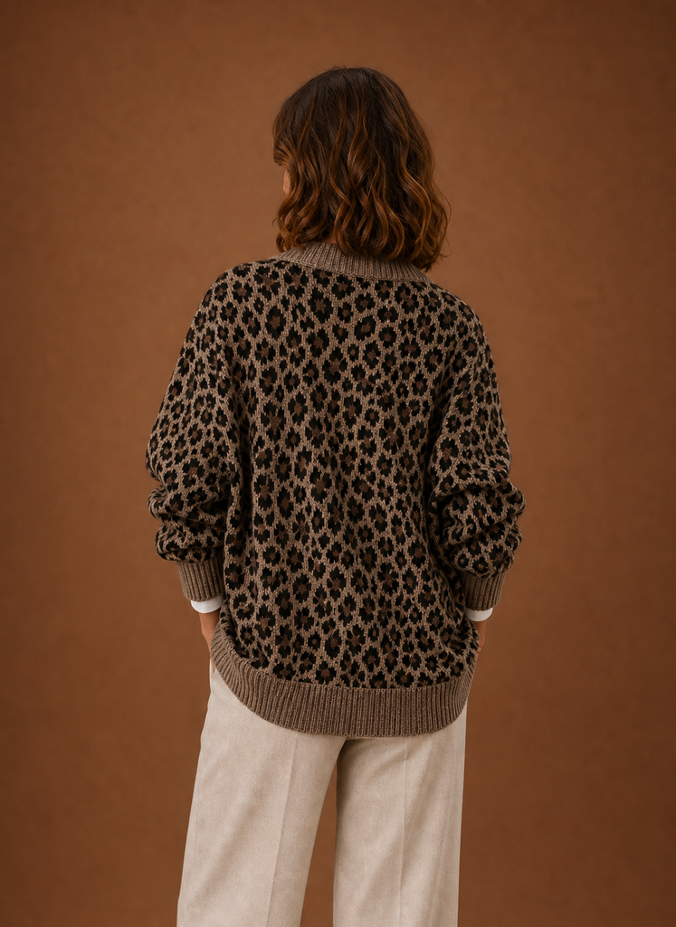 Back view of women's cardigan sweater with leopard print pattern