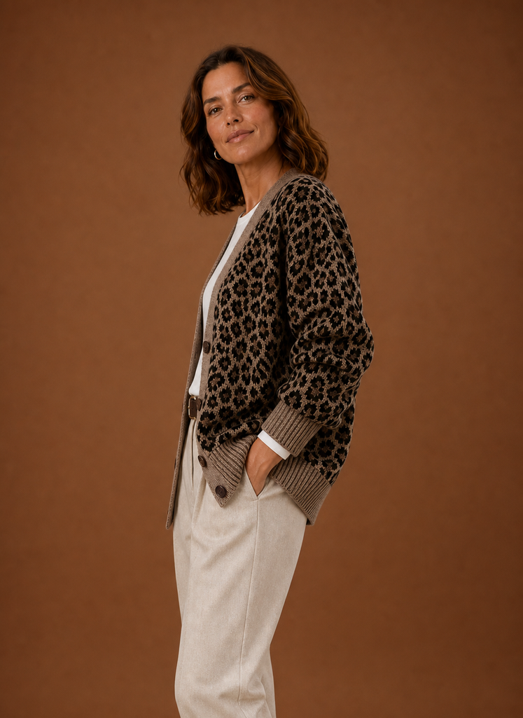 Side profile of women's button-up cardigan showing V-neck and long sleeves