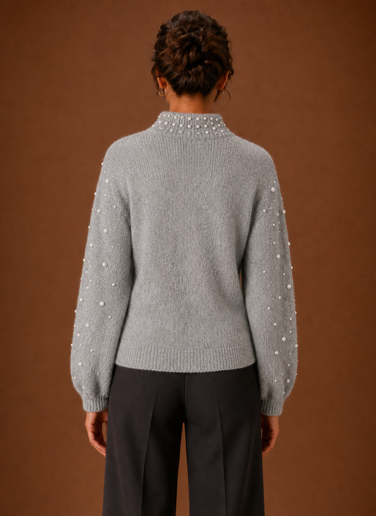 Back view of women's knit pullover sweater