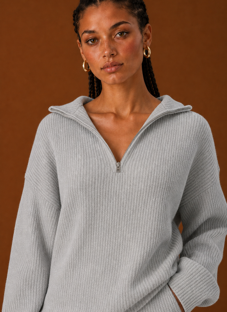 Close-up of stitching and texture on the tracksuit top