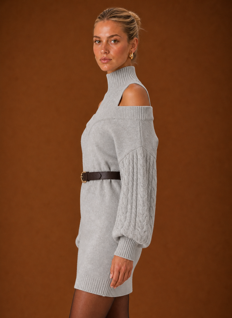 Side view of Areleon women's sweater dress in black showing relaxed fit and ribbed hem