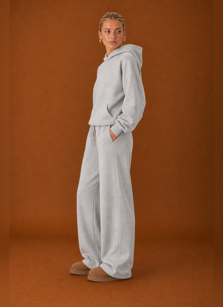Side profile of the sweatsuit highlighting the fit of the top and pants