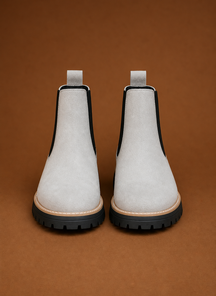 Side view of women's Chelsea ankle boot highlighting silhouette and sole