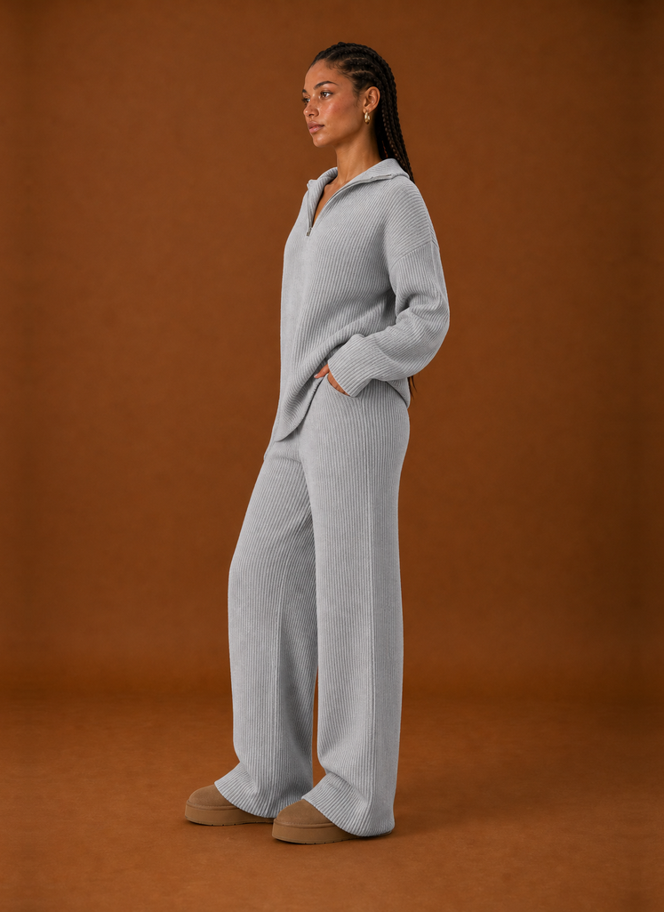 Side profile of the tracksuit set displaying the relaxed silhouette and fit