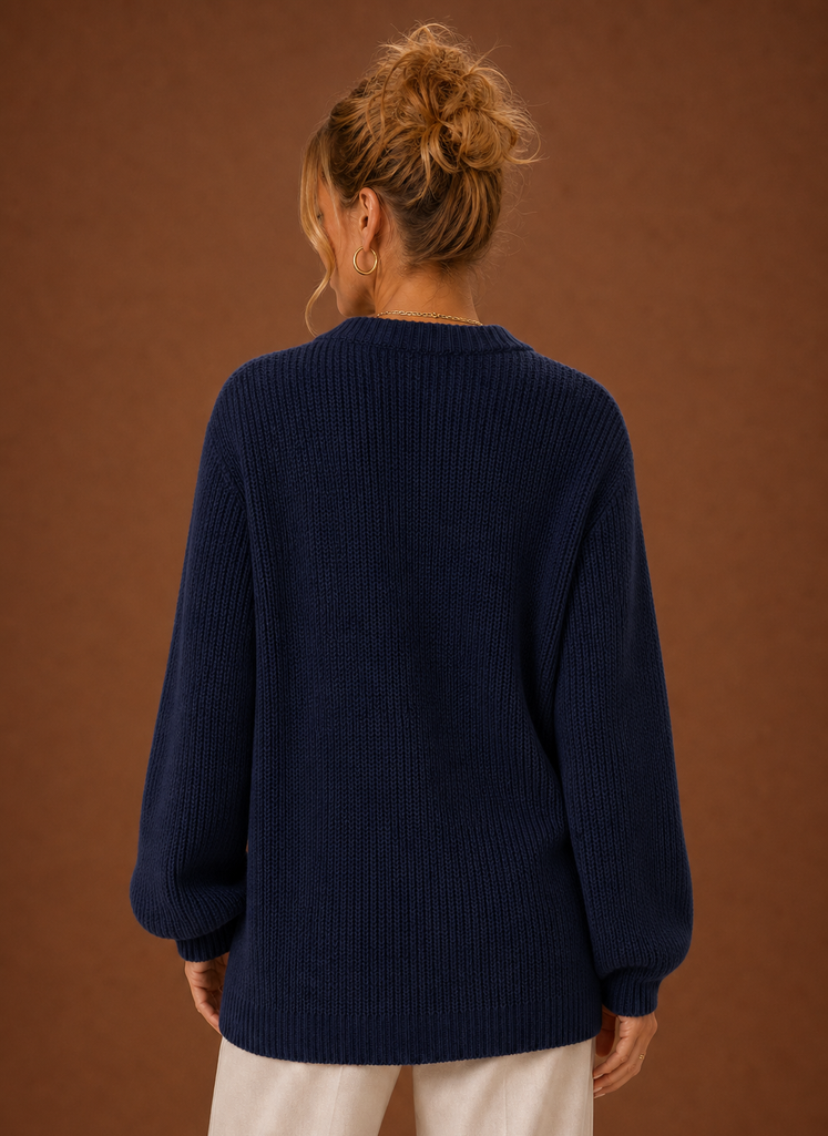 Back view of women's knit cardigan showing clean hemline and fitted shoulders