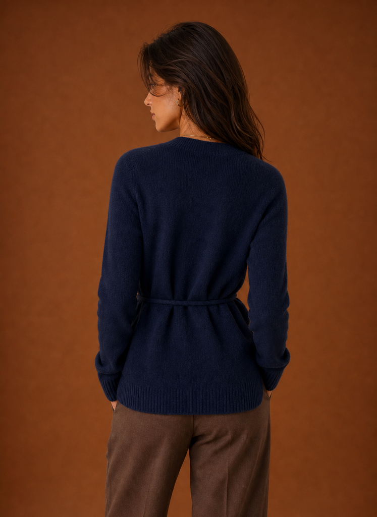 Back view of the women's wrap cardigan showing the knit back and belt detail