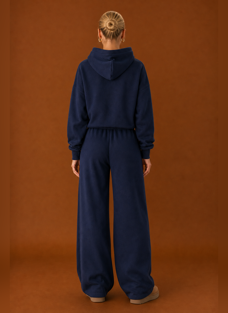 Back view of the matching sweatsuit set showing a clean silhouette