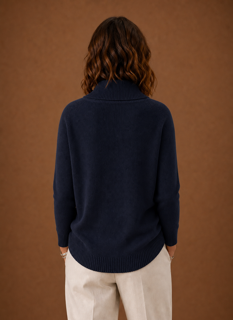 Back view of Areleon women's cowl neck knit sweater showing silhouette and hem