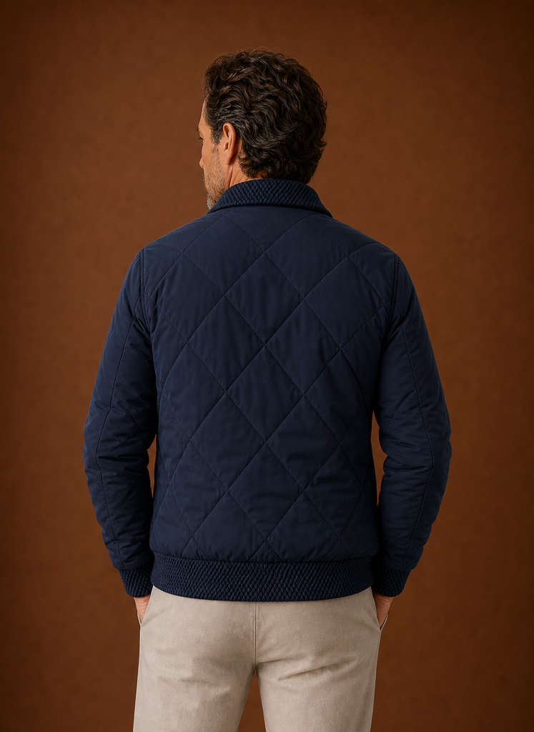 Back view of men's quilted bomber jacket showing quilted pattern