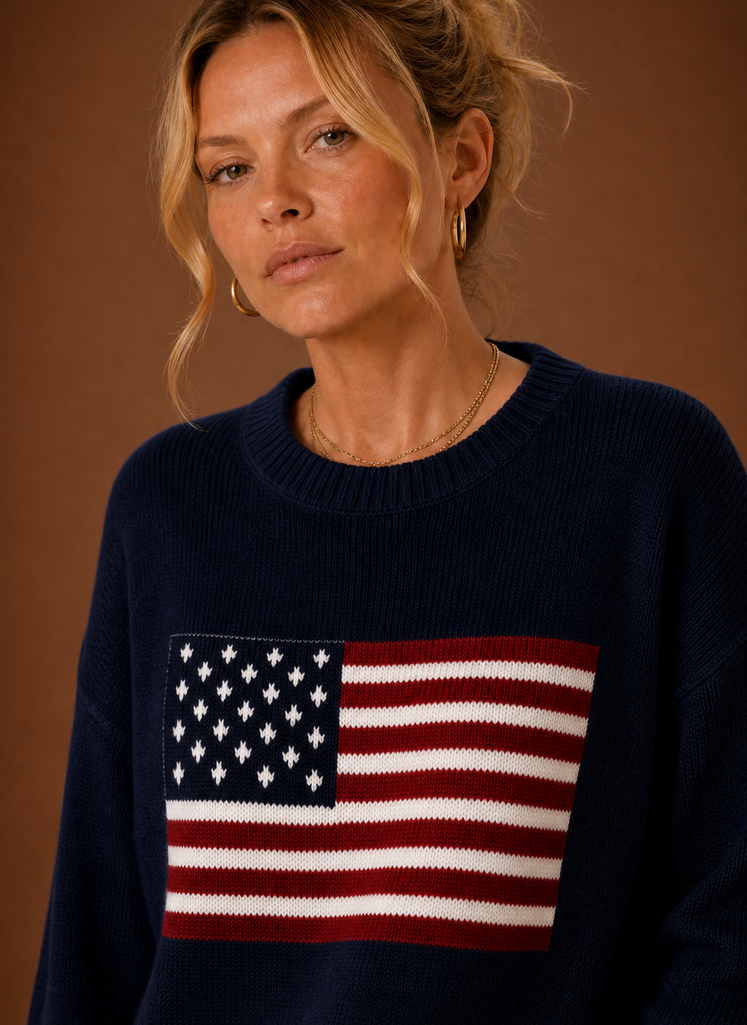Close-up of American flag graphic and crew neckline on Areleon pullover