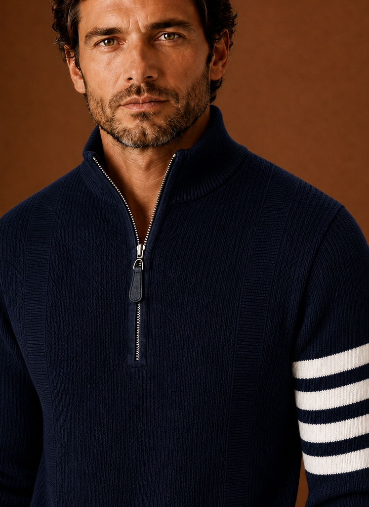 Close-up of the knit texture and half-zip closure with stripe detail