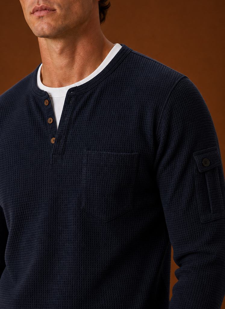 Close-up of the Henley shirt's button-placket and neckline detailing
