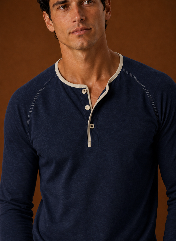 Close-up of the Henley shirt button placket and neckline stitching