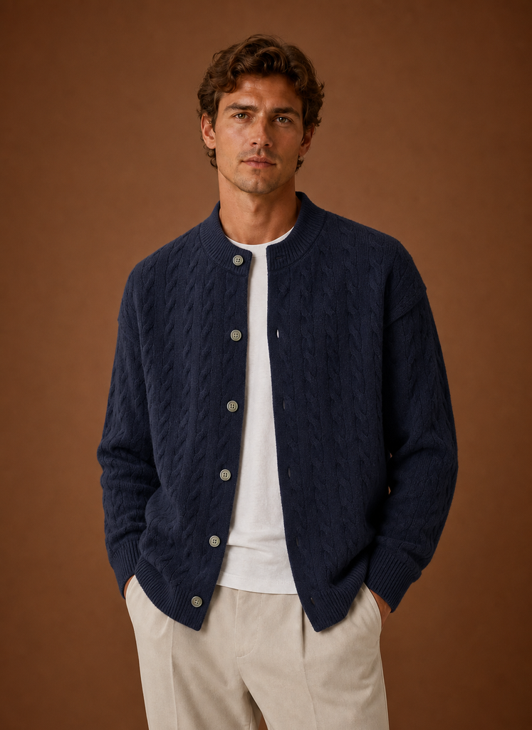 Front view of men's cable knit cardigan with button-front closure on a mannequin