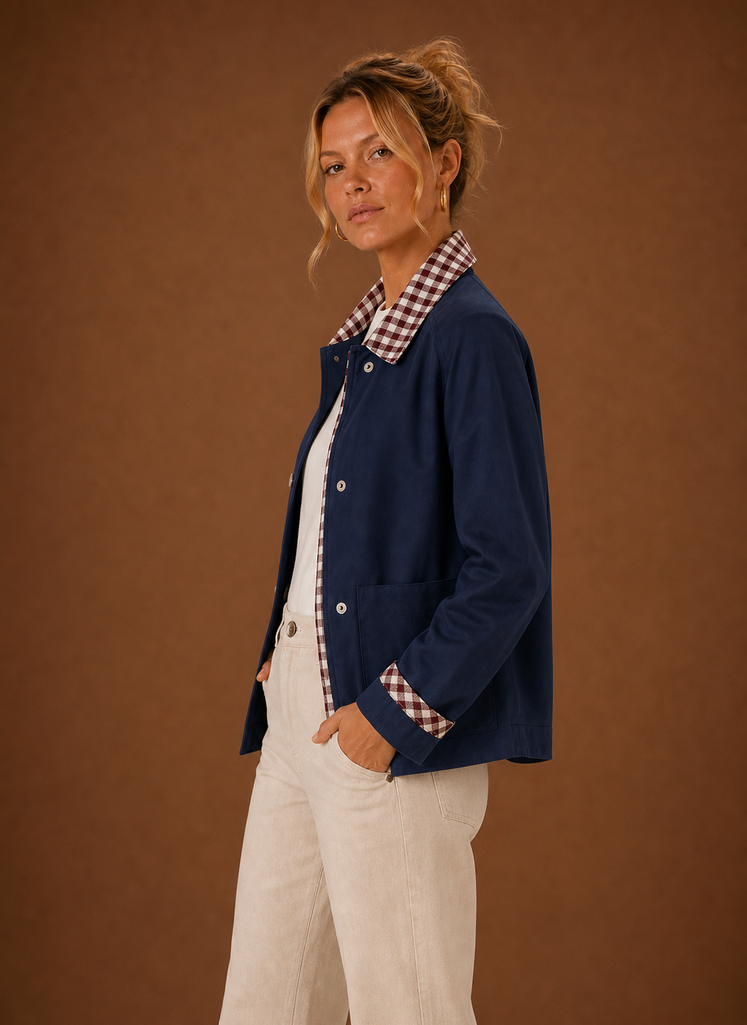 Side view of the barn jacket highlighting the relaxed fit and cropped silhouette