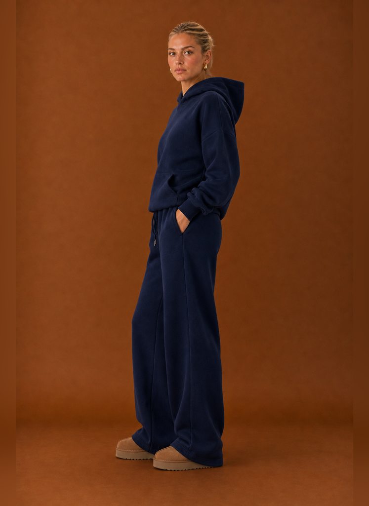 Side profile of the sweatsuit highlighting the fit of the top and pants