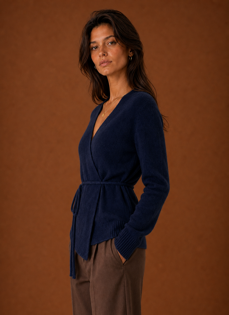 Side view showing the wrap silhouette and tied waist of the women's cardigan