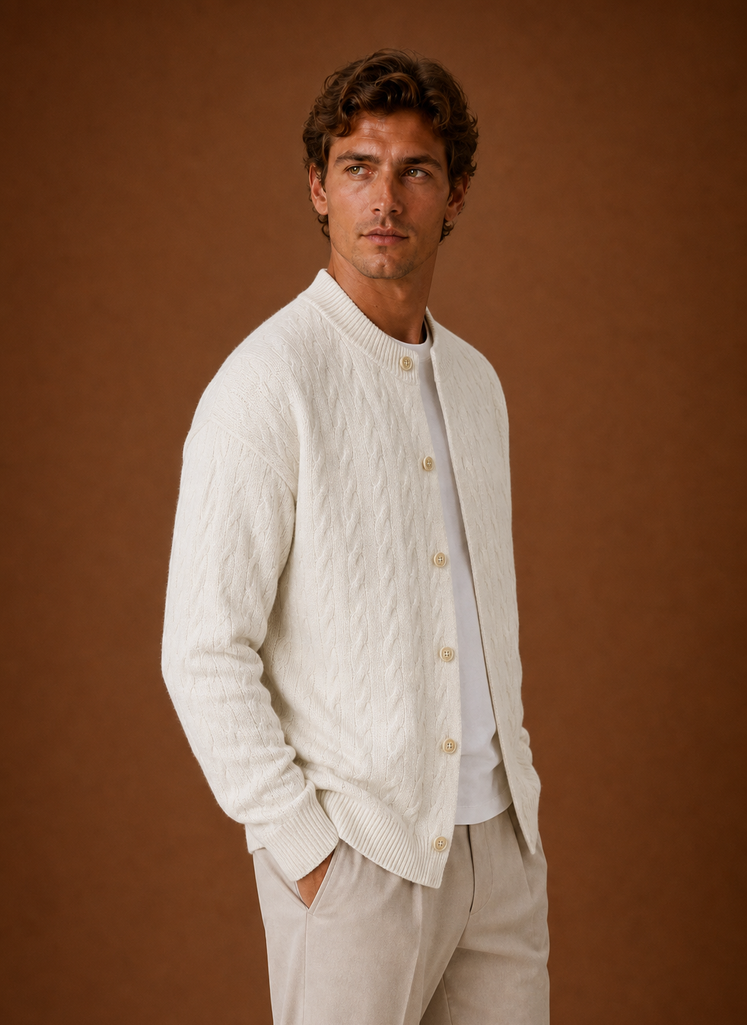 Side profile of men's cable knit cardigan showing long sleeve silhouette