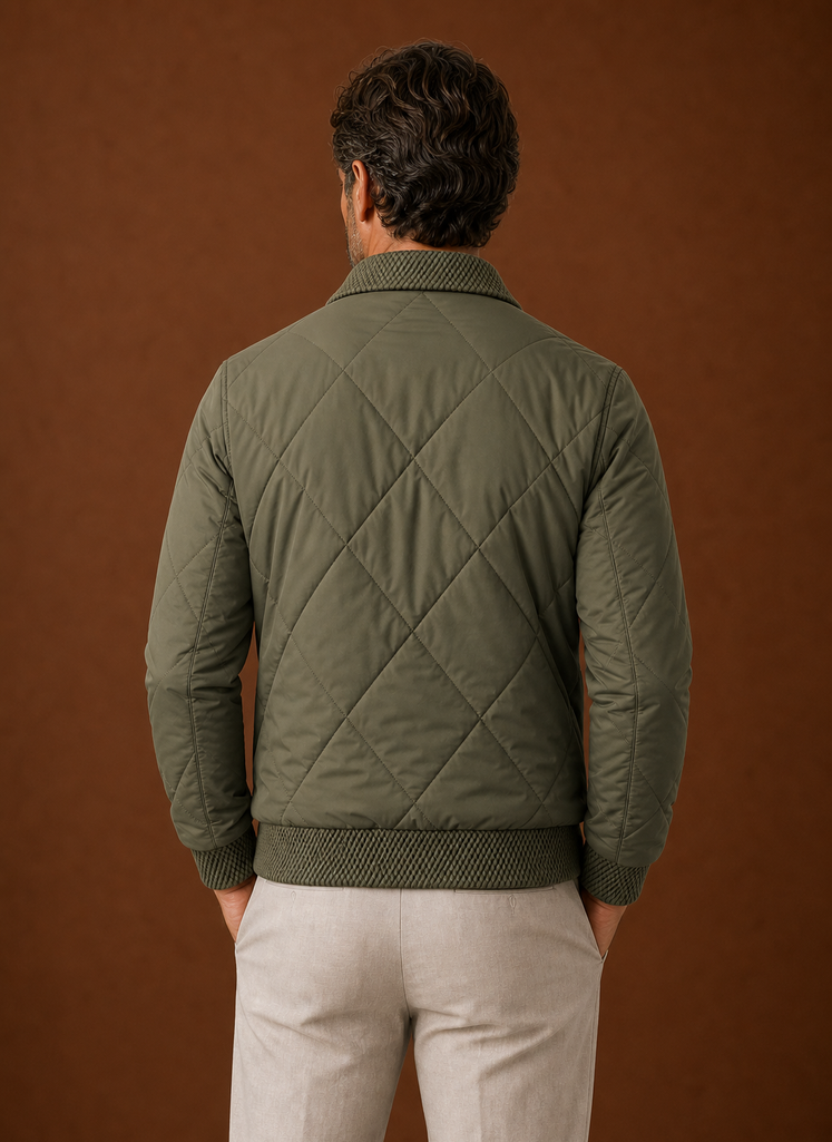 Back view of men's quilted bomber jacket showing quilted pattern