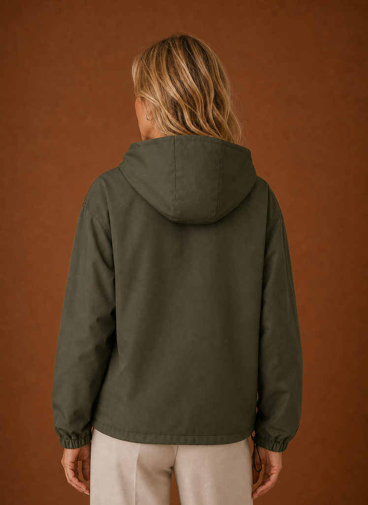 Back view of women's hooded windbreaker jacket displaying clean lines
