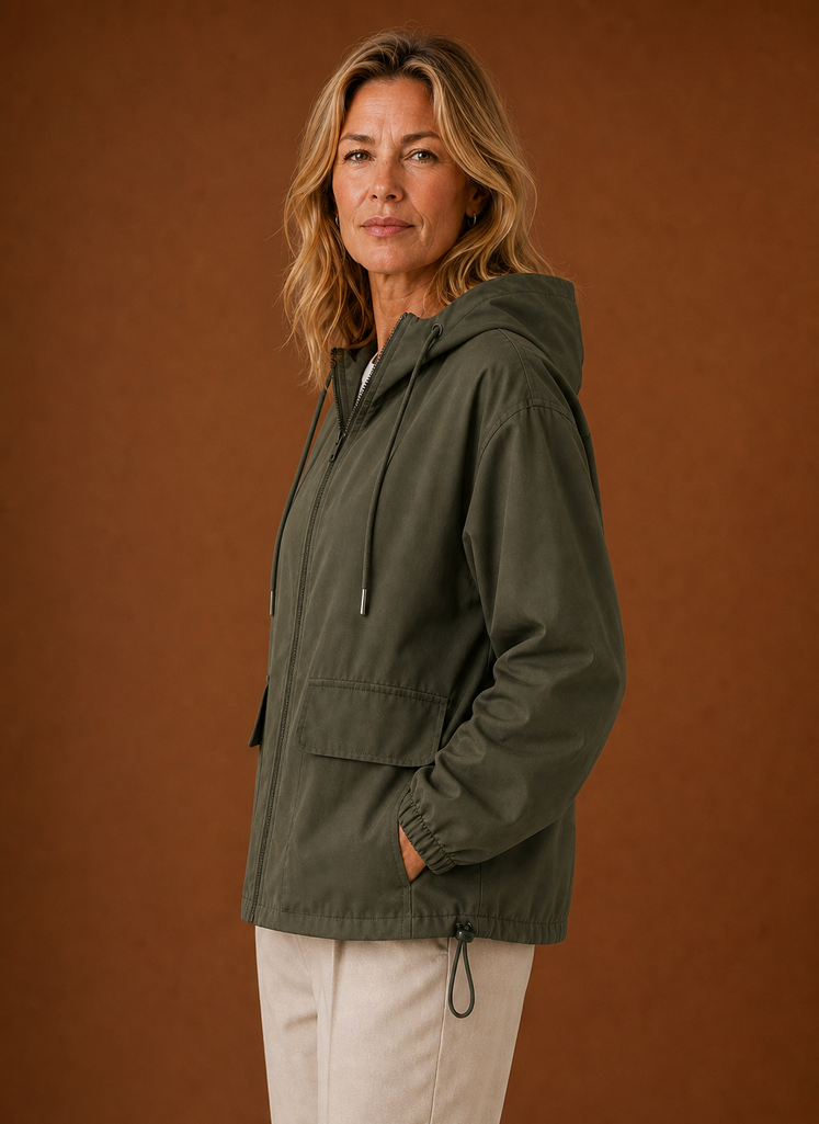 Side profile of women's hooded windbreaker jacket showing silhouette and hood