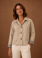 Front view of women's knit button-front cardigan on a mannequin showing V-neck and button closure