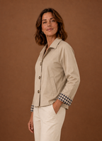 Side view of cardigan showing relaxed drape and long-sleeve silhouette