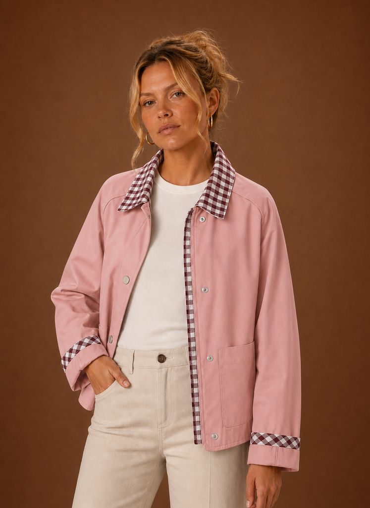 Front view of the women’s barn jacket showing the contrast check collar and button-front design