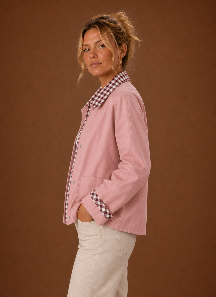 Side view of the barn jacket highlighting the relaxed fit and cropped silhouette