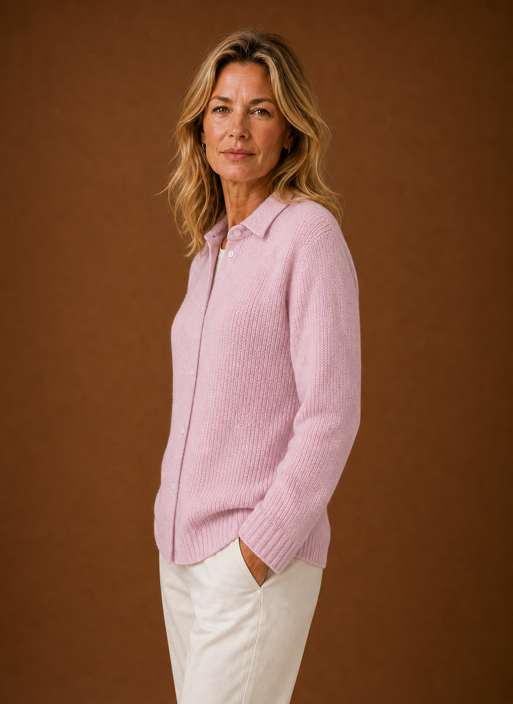 Side view of women's knit cardigan showing profile and sleeve shape