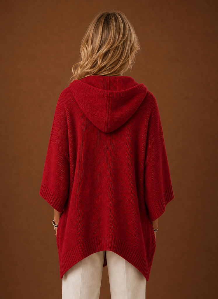 Back view showing hood and straight hem of the pullover