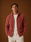 Front view of a men's ribbed knit cardigan on neutral background
