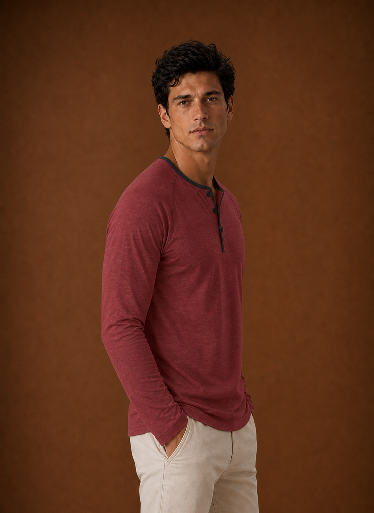 Side view of a men's Henley shirt displaying fit and sleeve line