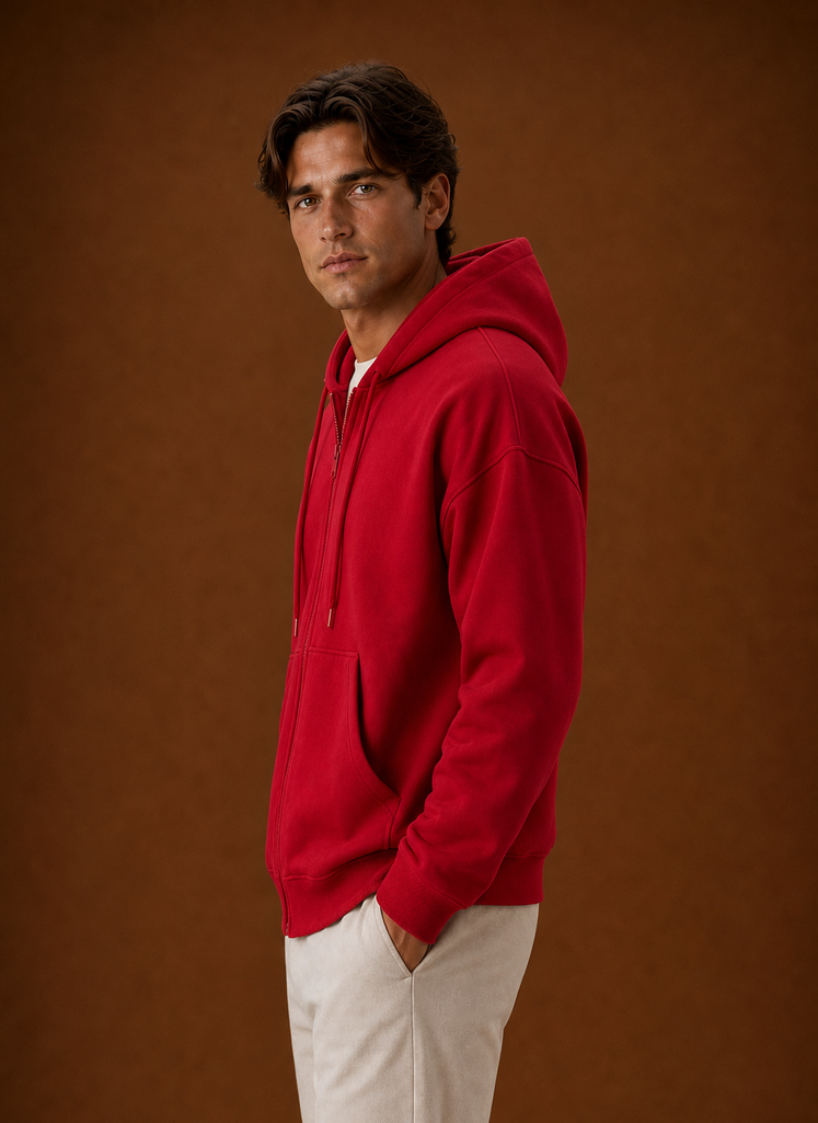 Side view of hoodie highlighting the attached hood and zip closure