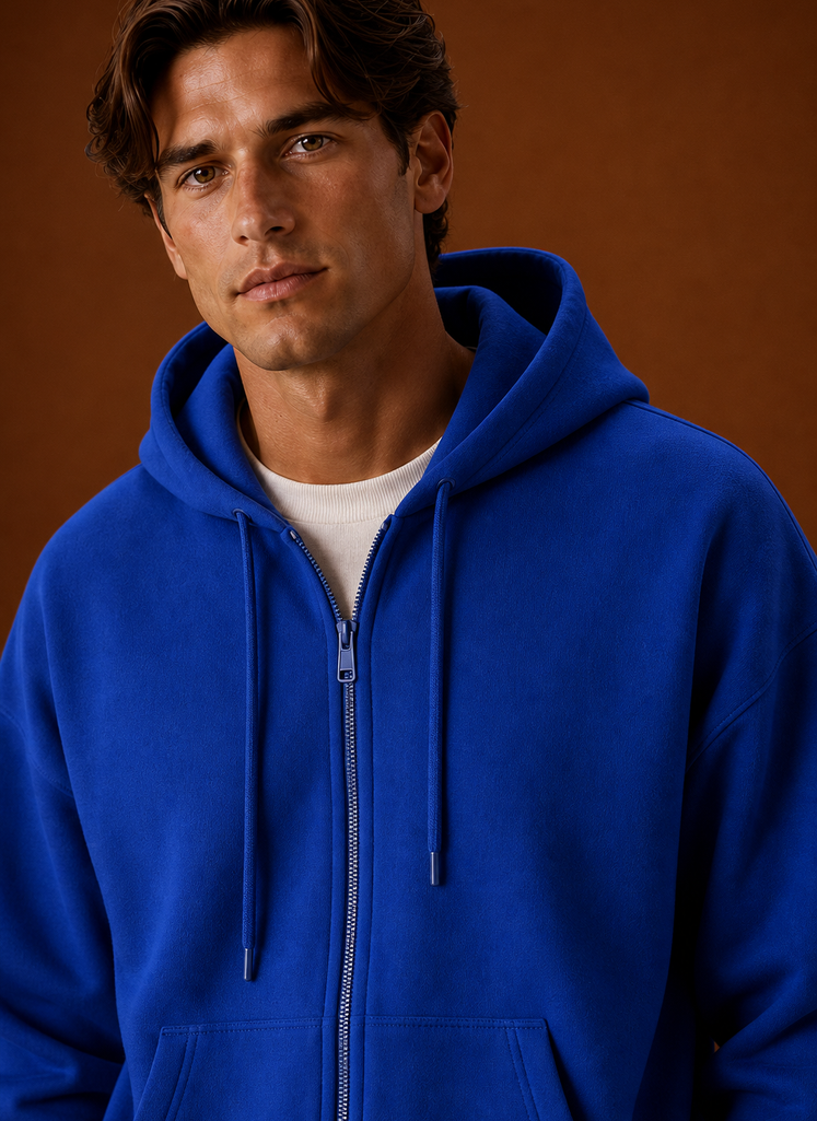 Close-up of the zipper and stitching details on the hoodie