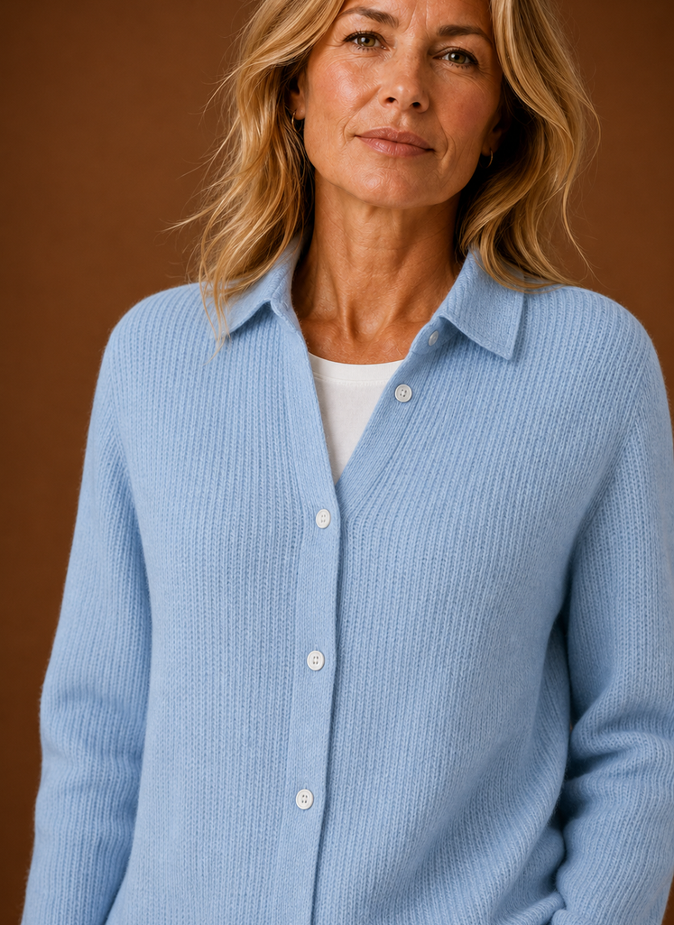 Close-up of button-front and knit texture on women's cardigan