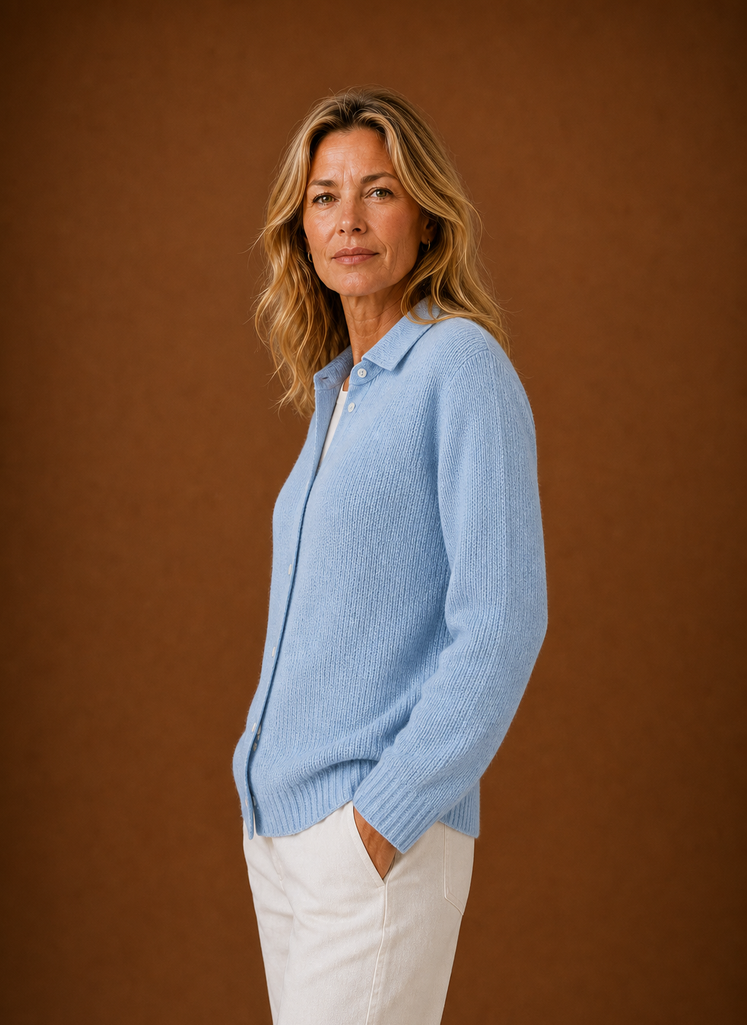 Side view of women's knit cardigan showing profile and sleeve shape