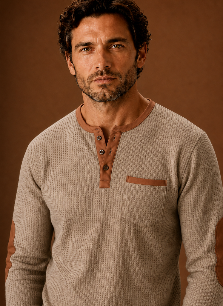 Close-up of waffle knit texture and Henley button placket on the shirt