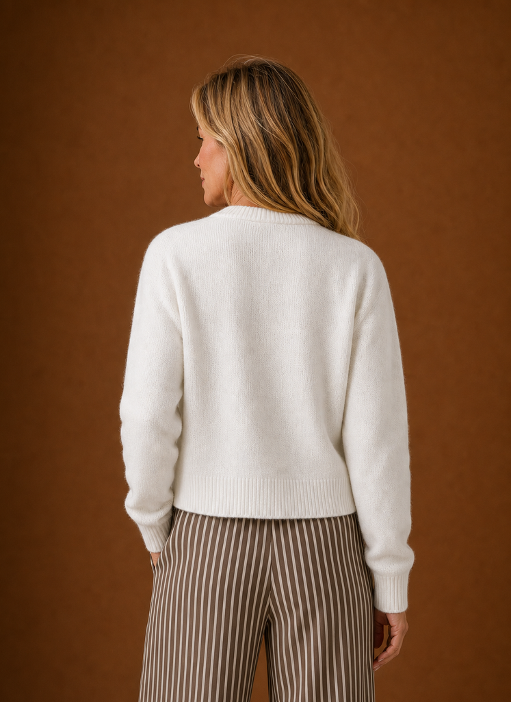 Back view of the women's crew neck cardigan showing the overall fit