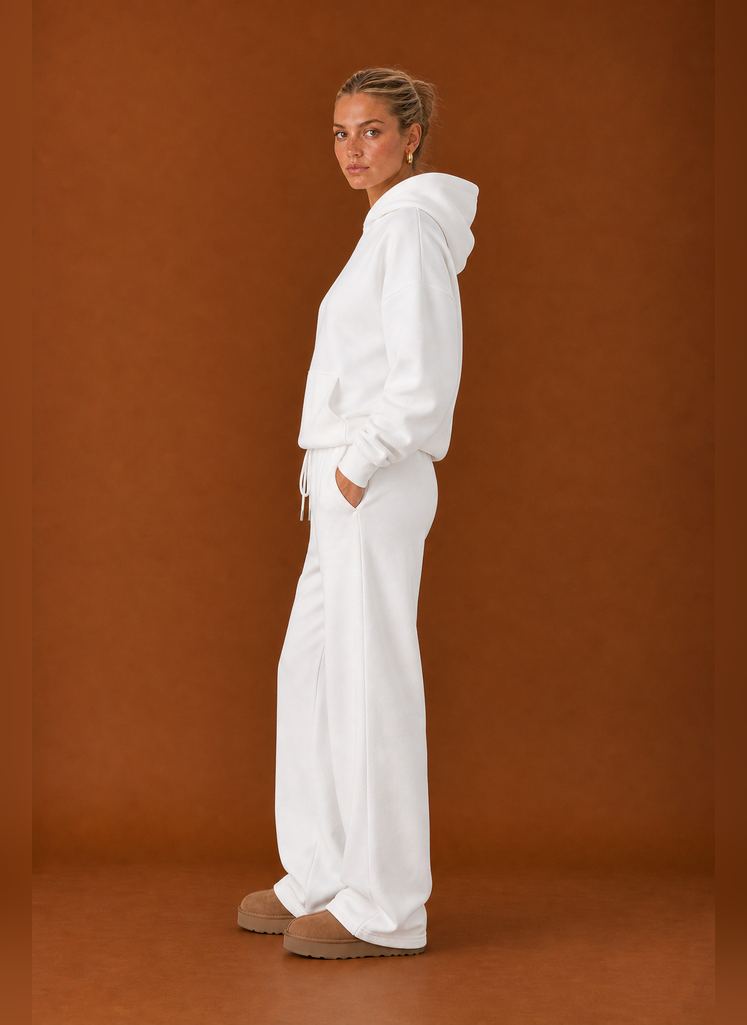 Side profile of the sweatsuit highlighting the fit of the top and pants