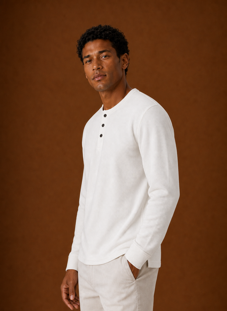 Side profile of men's Henley shirt displaying sleeve and silhouette