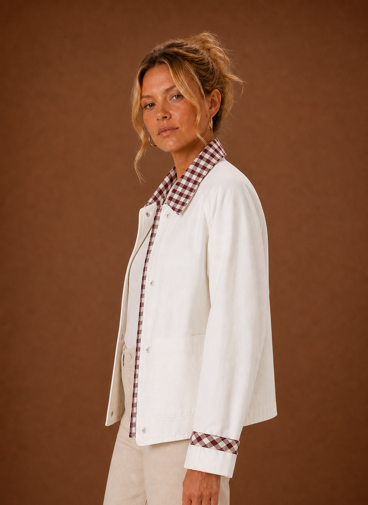 Side view of the barn jacket highlighting the relaxed fit and cropped silhouette