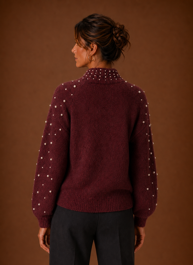 Back view of women's knit pullover sweater