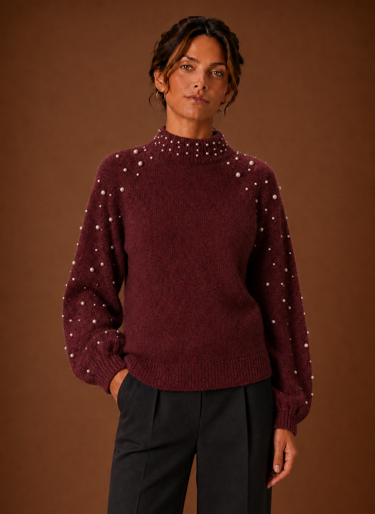 Front view of women's pearl embellished knit pullover sweater