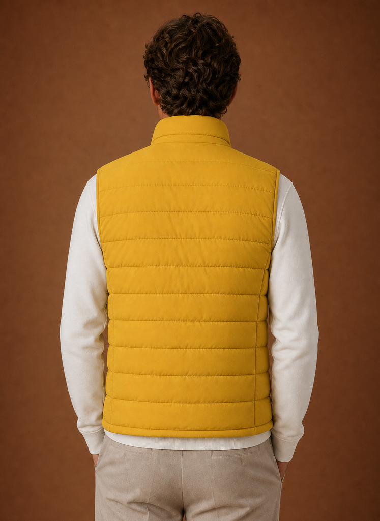Back view of men's puffer vest showing horizontal quilting and clean lines